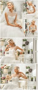  Bride in an elegant wedding dress - Stock photo 